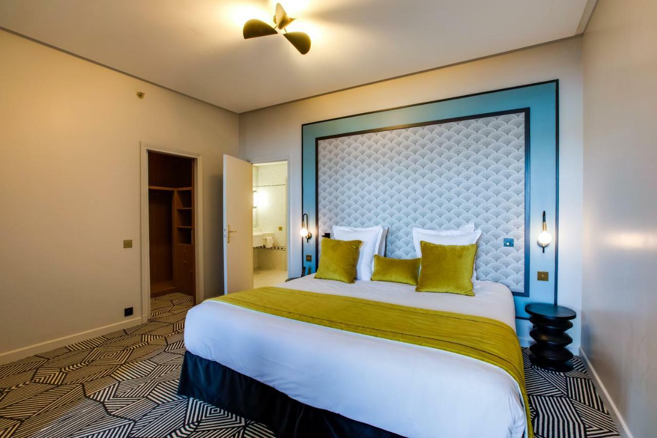 Le Palace De Menthon Экстерьер фото A bedroom at the hotel